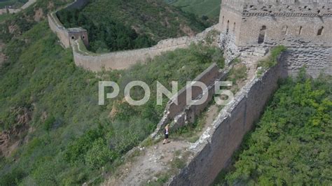 Drone view on travelers who are walking on Chinese Great wall Stock Footage #AD ,#travelers# ...