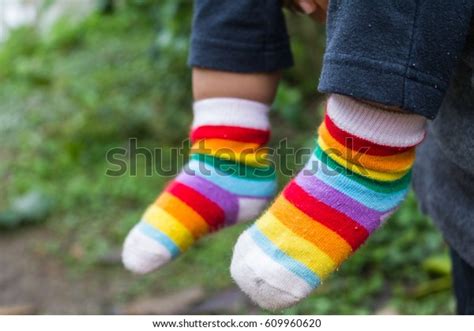 Kid Feet Wearing Colorful Socks Winter Stock Photo (Edit Now) 609960620