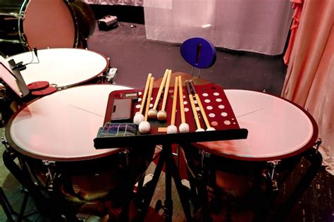 Premium Photo | Percussion musical instrument timpani with drum sticks ...