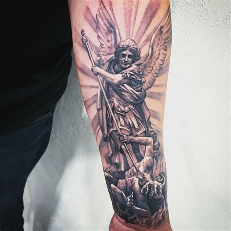 Details more than 74 archangel michael tattoo drawings super hot - in ...