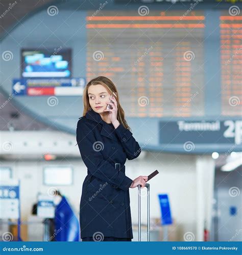 Woman in International Airport Stock Photo - Image of terminal, commuter: 108669570