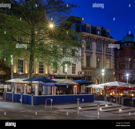 Outdoor restaurants in The Bigg Market at dusk, Newcastle upon Tyne ...