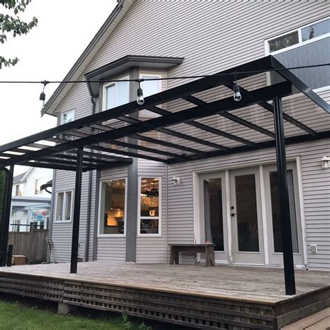 Metal Patio Cover with Glass Roof - Econowise Sunrooms & Patio Covers