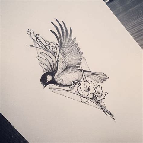 Flying sparrow with flowers on rhombus background tattoo design ...