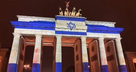 World landmarks lit in blue-and-white as U.S. sends munitions in practical support | World ...