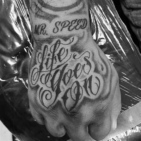 40 Amazing Life Goes on Tattoo Designs for Men | Life goes on tattoo, Hand tattoos for guys ...