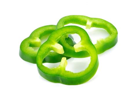 Premium Photo | Sliced green pepper isolated on white