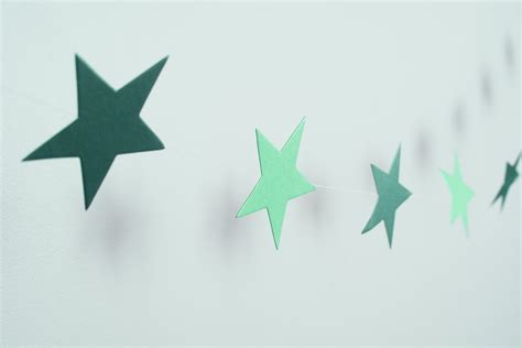 Photo of String of simple green Christmas paper stars | Free christmas images