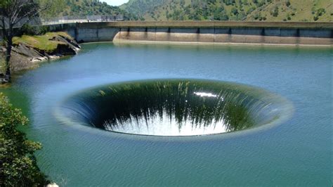 Man Flies Drone Inside Unusual Hole In The Middle Of A Lake And ...