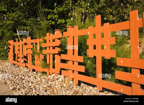 Wooden Japanese style fence in a landscaped front yard Zen garden in summer Stock Photo - Alamy