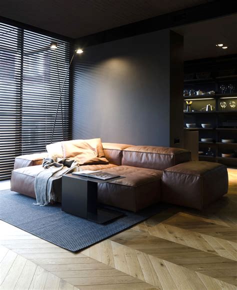 Small Masculine Apartment in Dark Color Schemes - InteriorZine