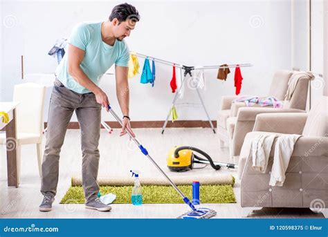 Man Cleaning House from Mess Stock Image - Image of dust, hygiene: 120598375