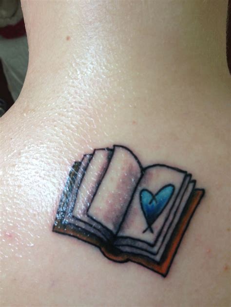 Blue heart and book tattoo