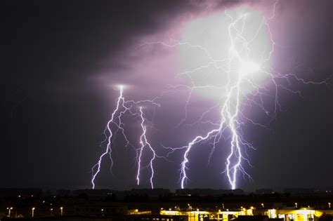 Cumulonimbus and lightning over the city Stock Photo 06 free download