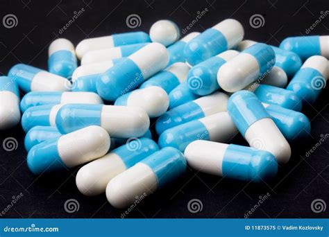 Blue And White Capsules Royalty Free Stock Photo - Image: 11873575