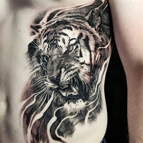 Black and grey tiger tattoo on the left side.