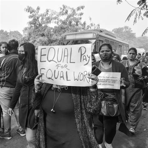 People Holding Protest Signs during a Demonstration · Free Stock Photo