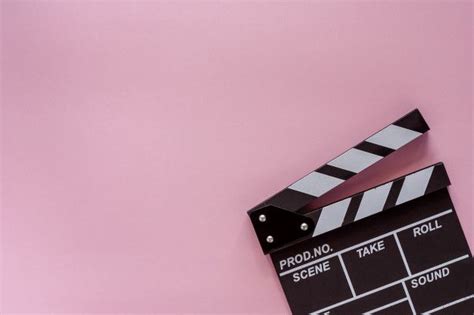 Premium Photo | Movie clapper board on pink background for filming equipment | Pink camera, Pink ...