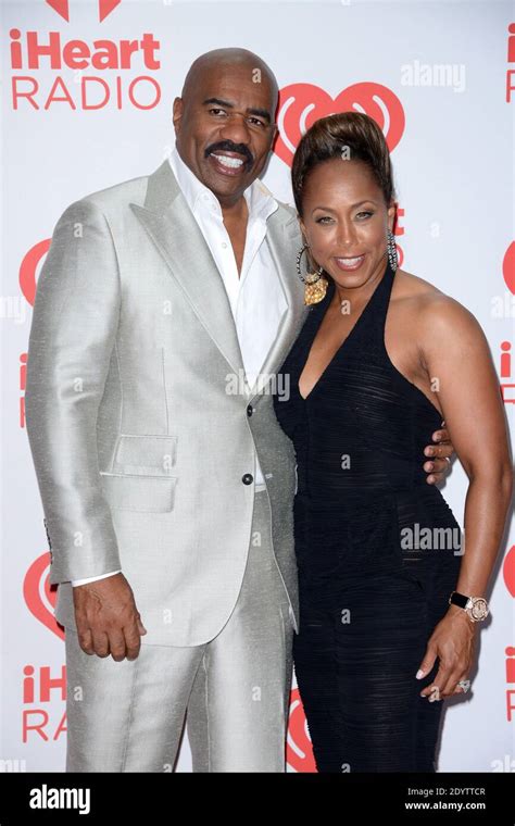 Steve Harvey and wife Marjorie Bridges pose in the press room of the 2013 iHeartRadio Music ...