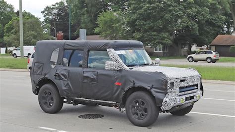 Spy Photos: New Ford Bronco Hybrid With Built-in Overland Accessories? | DrivingLine