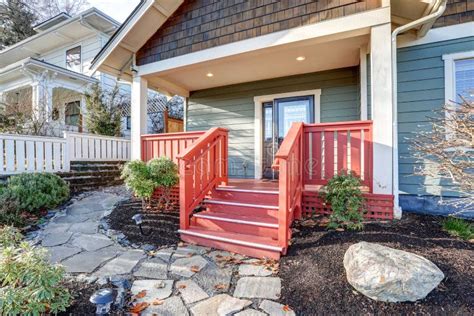 Nice Craftsman Home with Covered Red Porch Stock Image - Image of roof, green: 89539299