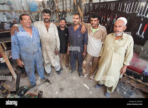 Migrant Workers in Doha Qatar Stock Photo - Alamy