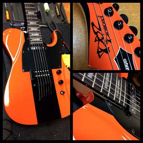 DBZ Orange Electric Guitar with Black and White Stripes