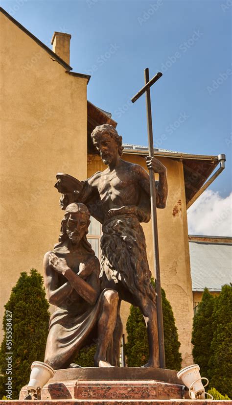 Statue of the baptism of Jesus Christ by John the Baptist. Stock Photo | Adobe Stock