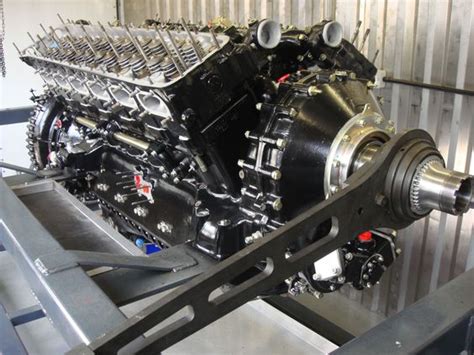 The Rolls Royce Merlin. 27 litre Supercharged V12. This engine shaped ...