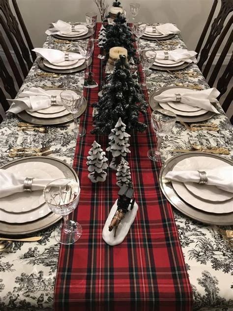 This classic red stewart tartan plaid table runner effortlessly transforms any table into ...