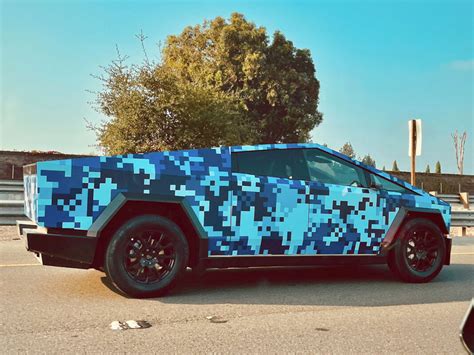 Cybertruck spotted with a blue-pixel pattern wrap, Tesla might just ...