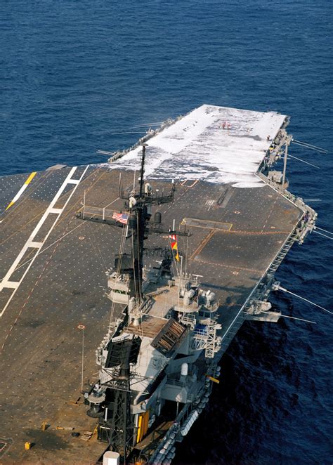 An aerial starboard quarter view of the aircraft carrier USS JOHN F. KENNEDY (CV 67) as the ship ...