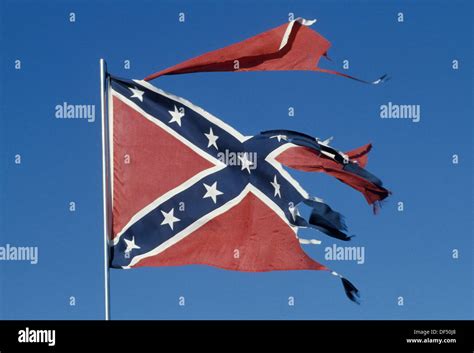 Torn and tattered Confederate Flag Stock Photo - Alamy