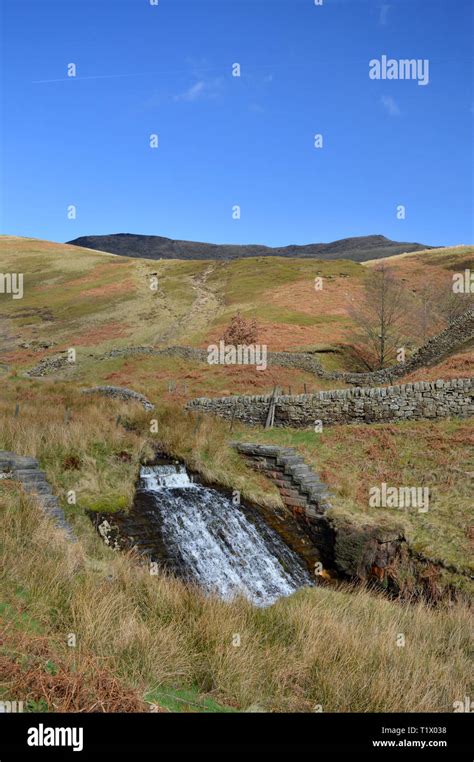 Kinder Scout waterfall flowing into the reservoir, Derbyshire Stock Photo - Alamy