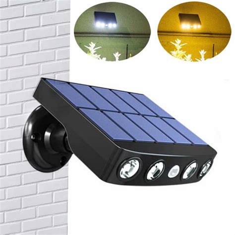 4 LED Solar Wall Light Motion Sensor Outdoor Lamp Imitation Monitoring Design Holiday Christmas ...