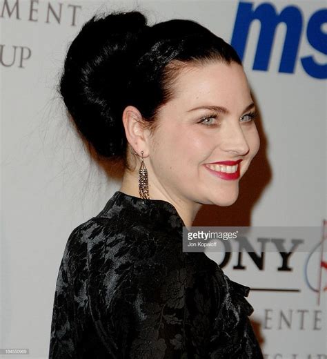 Singer Amy Lee arrives to the "Clive Davis Pre-Grammy Party" at the... | Amy lee, Amy lee ...