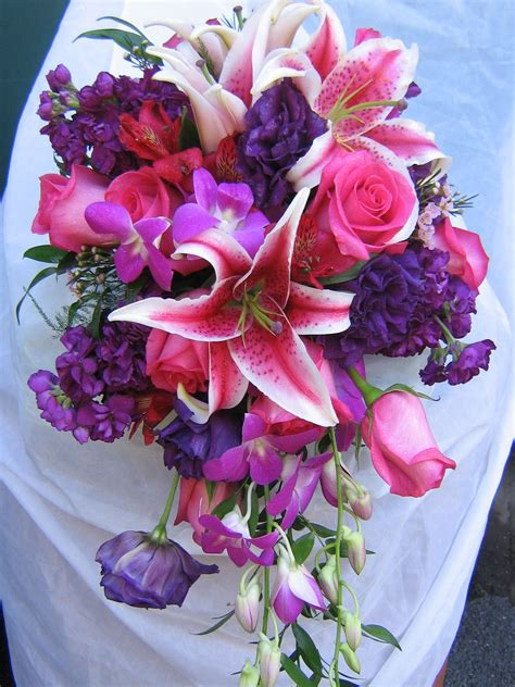 FlowersbySnellings; Cascade Bouquet of FRESH stargazer lilies, purple ...