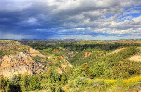 Rain in the distance at Theodore Roosevelt National Park, North Dakota ...