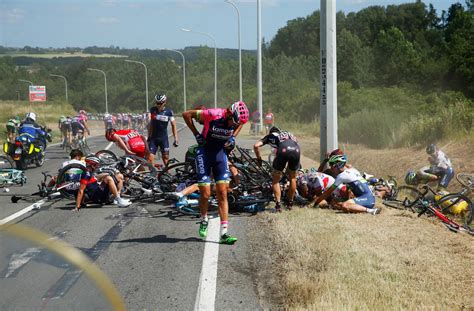 Massive crash at Tour de France leaves 20 riders on ground - CBS News