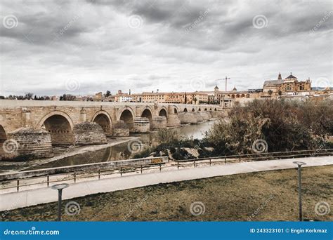 The Roman Bridge and the Calahorra Tower in Cordoba, Spain Editorial Photo - Image of historic ...