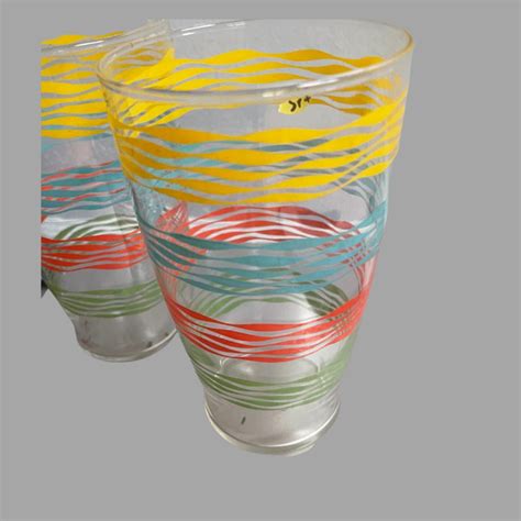 Two Vintage Rainbow Glass Tumblers | EstateSales.org