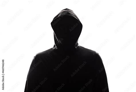 Zdjęcie Stock: silhouette man in a hood isolated on white background ...