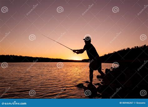 Fisherman at Sunset stock image. Image of water, nature - 86946267