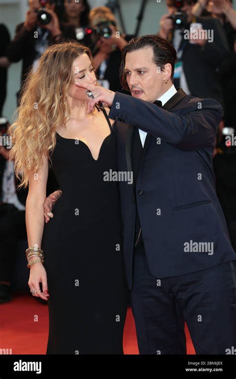 Johnny Depp and Amber Heard attends the 'Black Mass' red carpet during the 72nd Venice Film ...