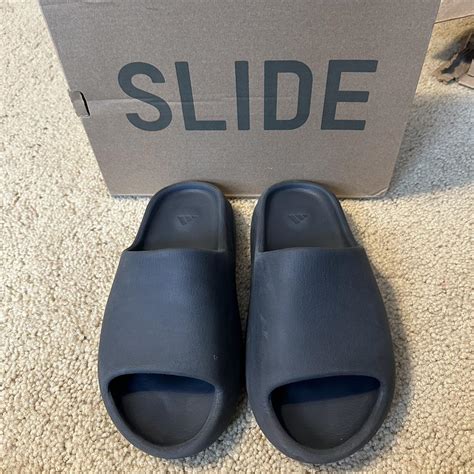 Yeezy slides black or onyx size 8 - Depop