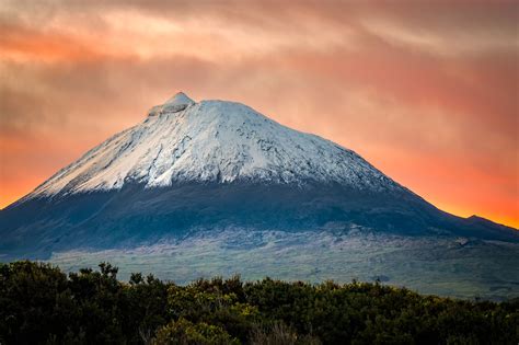 Sunrise on snowcapped Mount Pico - Mount Pico is a stratovolcano located on Pico Island (Azores ...