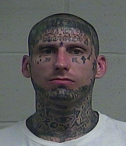 Police say suspects' tattoos led police to believe they might be simon city royals. why would ...