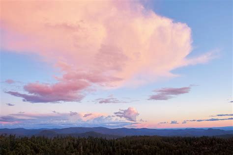 Pink Clouds Over Mountains at Sunset Photograph by Ben North - Fine Art ...