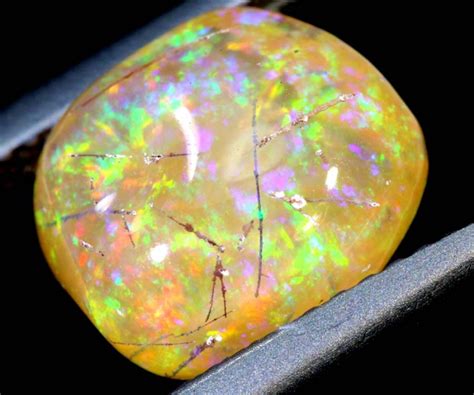 3.4-CTS MEXICAN FIRE OPALS CARVING FOB-1687