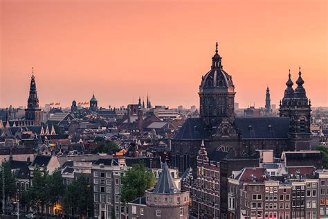 "Amsterdam Skyline At Dusk, The Netherlands" by Stocksy Contributor "Tom Uhlenberg" - Stocksy